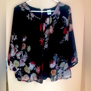 Elegant chiffon blouse with beautiful floral patterns for occasions.